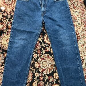 Three pairs of men’s jeans (2 Levi and 1 Wrangler)